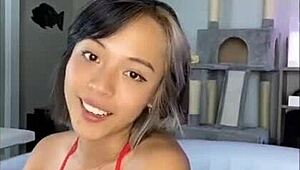 relaxing by the pool in a skimpy bikini on a sunny day