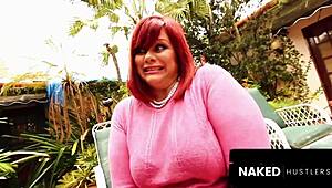 Tears of joy as redhead BBW milf rides young trainer's cock outdoors.