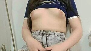 Skinny Teen Masturbates Tight Pussy in Bathroom Mirror