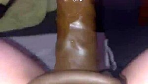 girl rams huge strap-on deep into his tight ass pegging