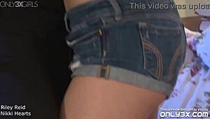 Riley Reid and Nikki Hearts Entwine as Passionate Lesbian Lovers