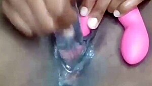 horny ebony babe squirts screaming in tight pussy vibrator orgasm!