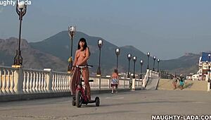 Naughty wife rides naked in public flashing her curves! 🌳🍑