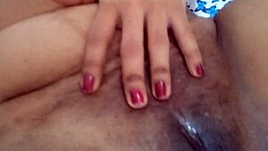 sexy housewife slips fingers deep into dripping wet pussy