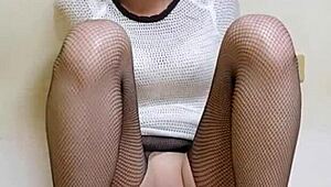 Ting Xuan rides dildo hard in fishnet stockings