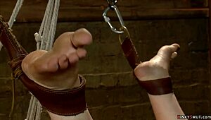 Butt plugged lesbian slave gets fucked hard in bondage with choking gagging! 😈