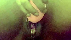 Webcam squirting close-up captures intense wet pussy release