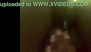 Watch this wet ebony babe fuck her pussy deep with huge dildo