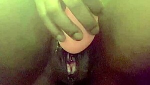 Webcam squirting close-up captures intense wet pussy release