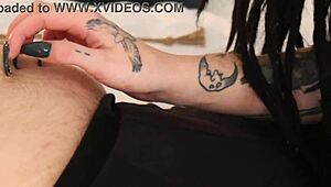 sexy british goth latex femdom ties teases with fishnets blue eyes long hair domination bedroom