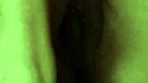 guy unloads cum on her face while she's kneeling close-up view