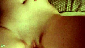 Hot babe fingers her dripping wet pussy hard.