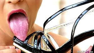 Skinny German photo model delivers versauter pov footjob in tight fishnets