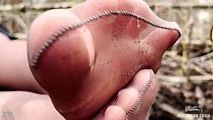 Forest Goddess Spreads Legs Teasing Feet in Tan Pantyhose