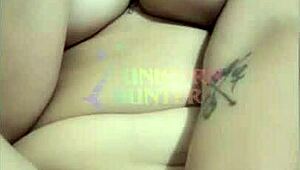 Brazilian cutie rams black dildo deep in her tight amateur ass on bed.