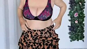 This horny busty gilf in stockings spreads wet pussy teasing big natural tits